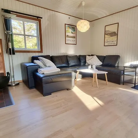Helles-ferienhaus-mit-kamin-grossem-grundstueck-und-zwei-terrassen Holiday home Norre Lyngby
